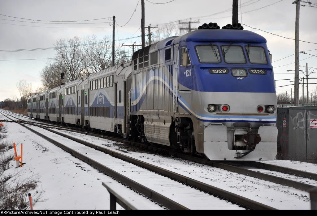 Outbound commuter shoves out of the station